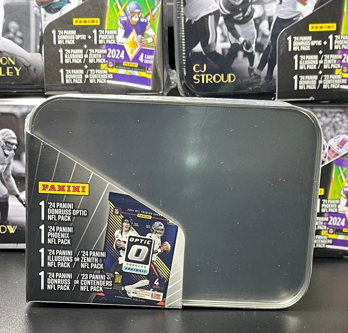 Micah Parsons '25 NFL MJ Holding TIN (Includes 2023-24 Panini Packs) image 1